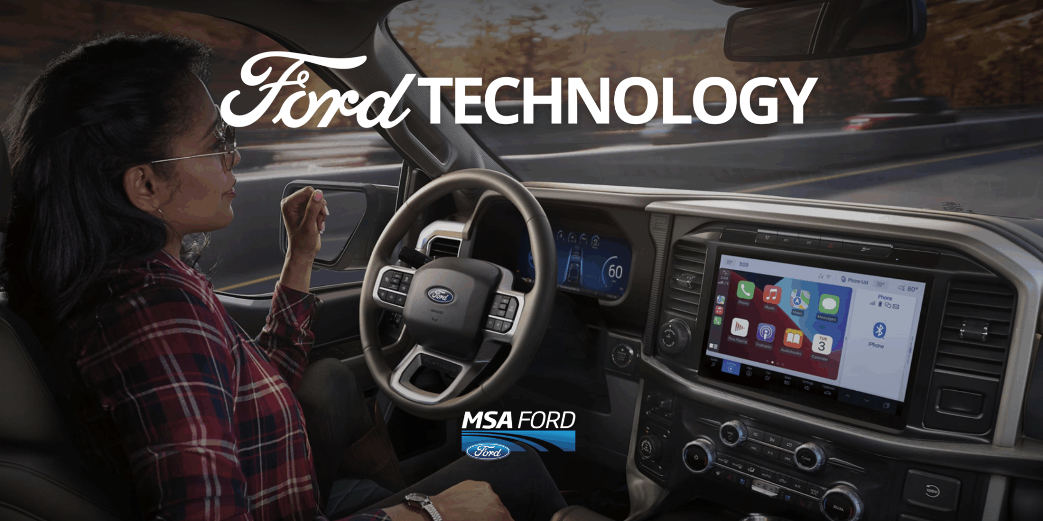 A woman driving a Ford vehicle equipped with Ford SYNC touchscreen and digital instrument cluster, highlighting innovative automotive technology.